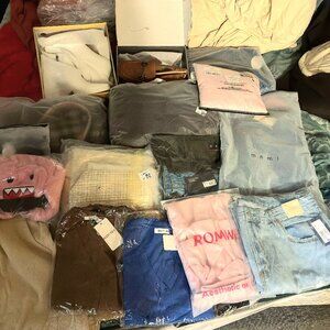 Women shirts boots dress shoes jackets pants sweater scarf its all here